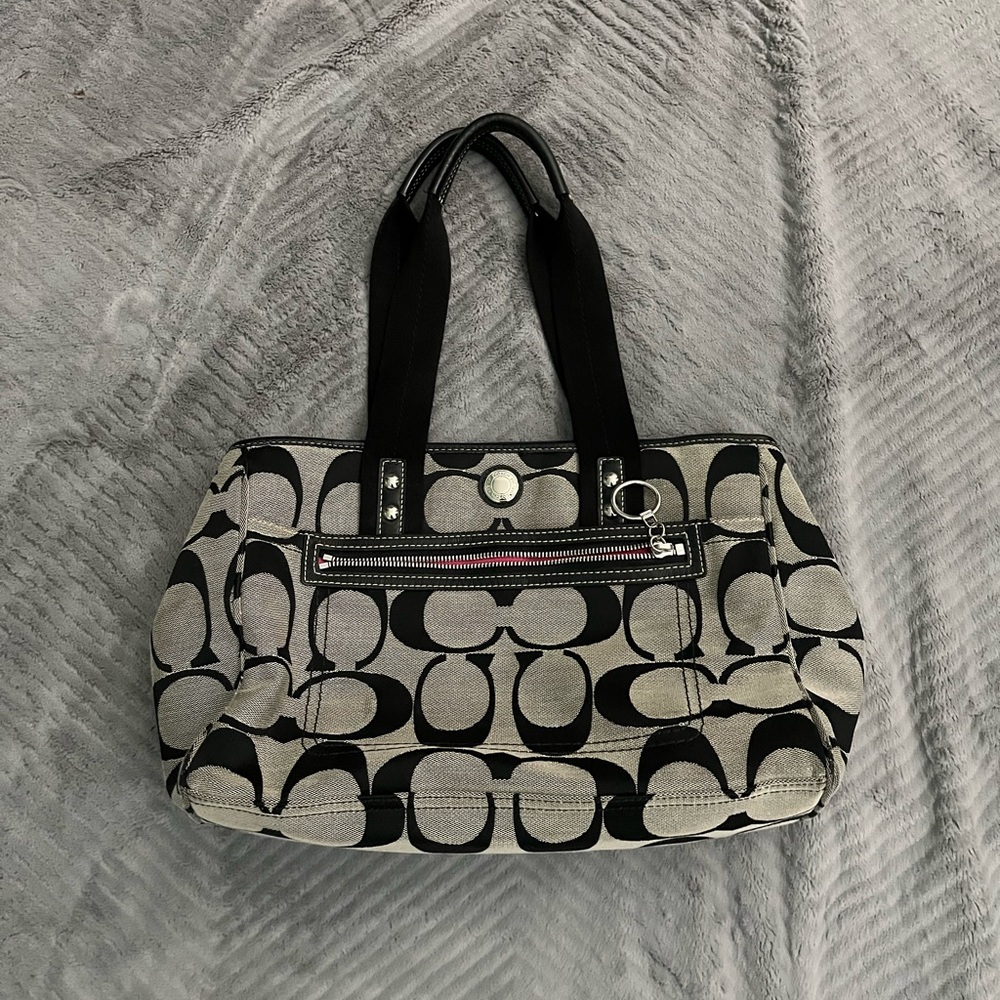 Old school coach bag with matching wallet.